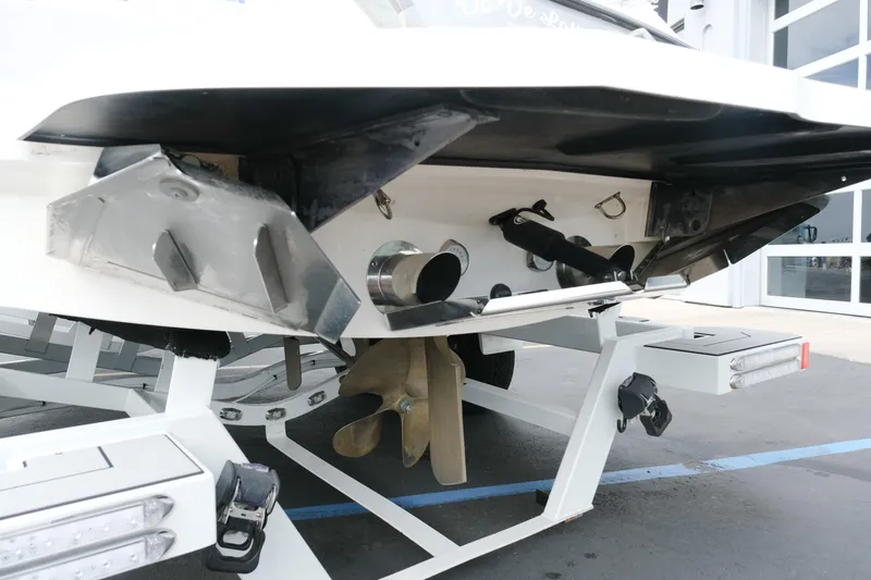 Slide: The Image of 2019 MasterCraft X22 boat trailer with propeller and exhaust system visible. - 7