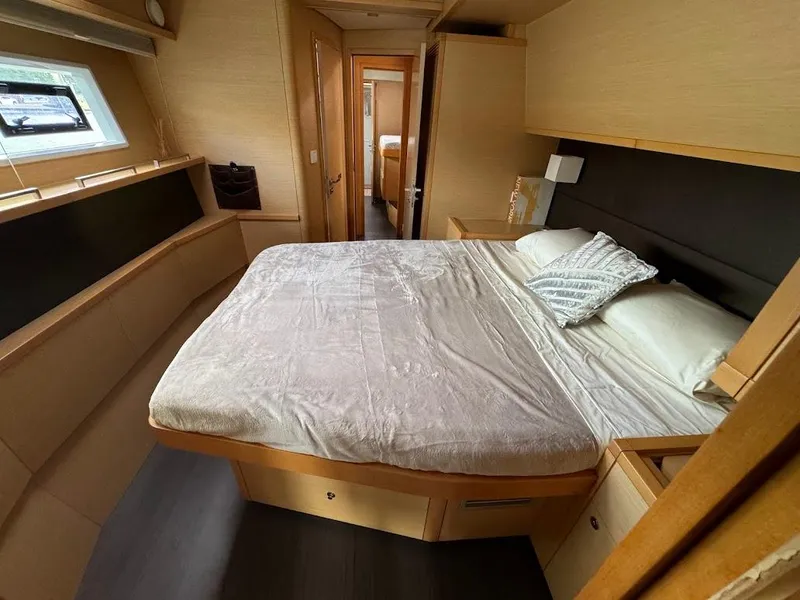 Slide: The Image of Luxurious bedroom interior of 2015 Lagoon Motor Yacht with cozy bed and modern design. - 22