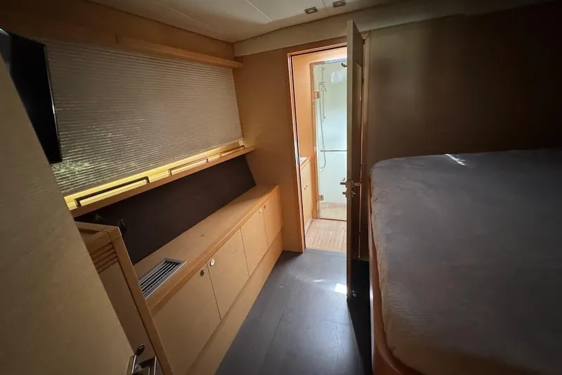 Slide: The Image of Luxurious 2015 Lagoon Motor Yacht interior with cozy bedroom and modern bathroom. - 33