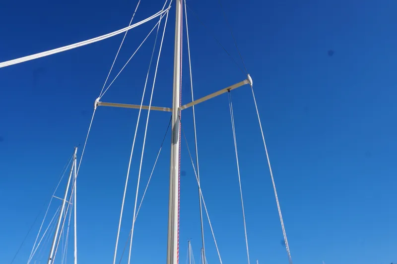 Slide: The Image of Mast of 2006 Alerion Express 28 sailboat against clear blue sky. - 24