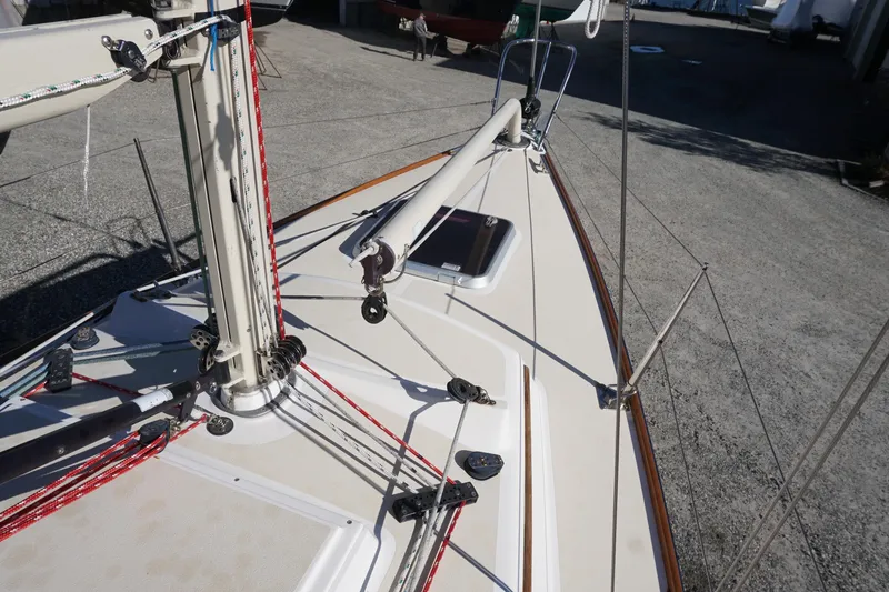 Slide: The Image of 2006 Alerion Express 28 sailboat deck with rigging and mast details. - 26