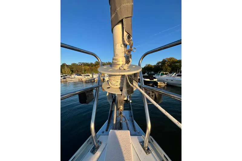 Slide: The Image of Bow view of 1996 Catalina 400 sailboat docked in a marina. - 22