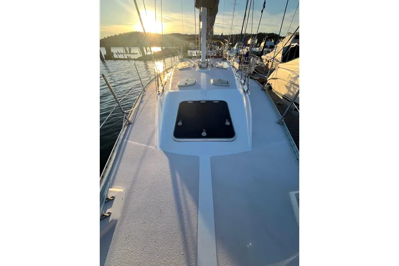 Slide: The Image of Sailboat deck of 1996 Catalina 400 at sunset, docked in a marina. - 23