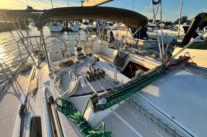 Slide: The Image of Sailboat deck of 1996 Catalina 400, docked at marina during sunset. - 26