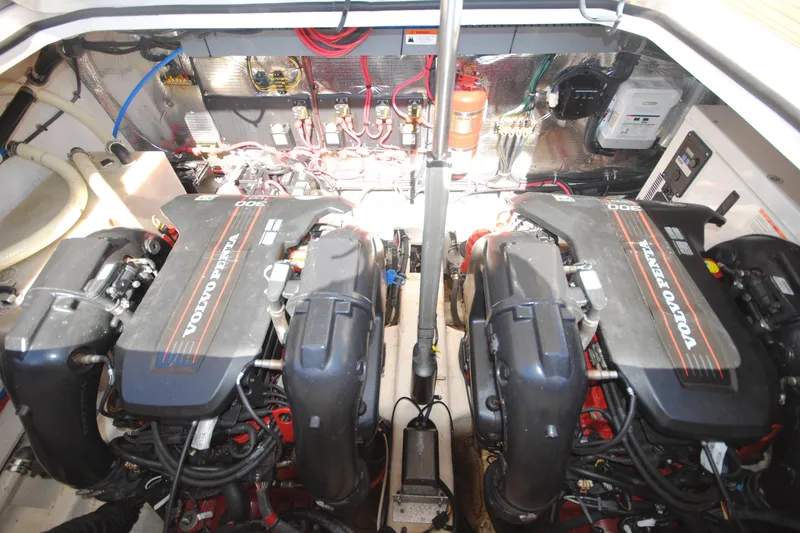 Slide: The Image of Engine compartment of a 2015 Regal 32 Express with dual Volvo Penta engines. - 22