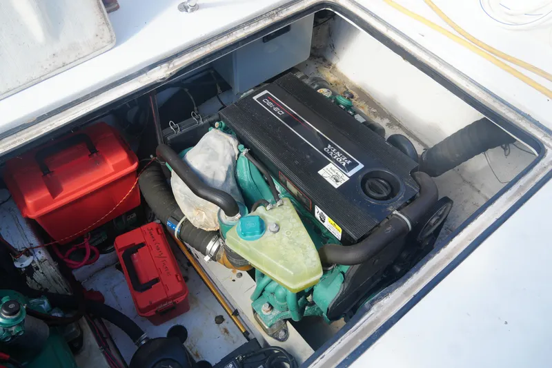 Slide: The Image of Engine compartment of a 1972 Viking 33 boat with visible Volvo Penta engine. - 31