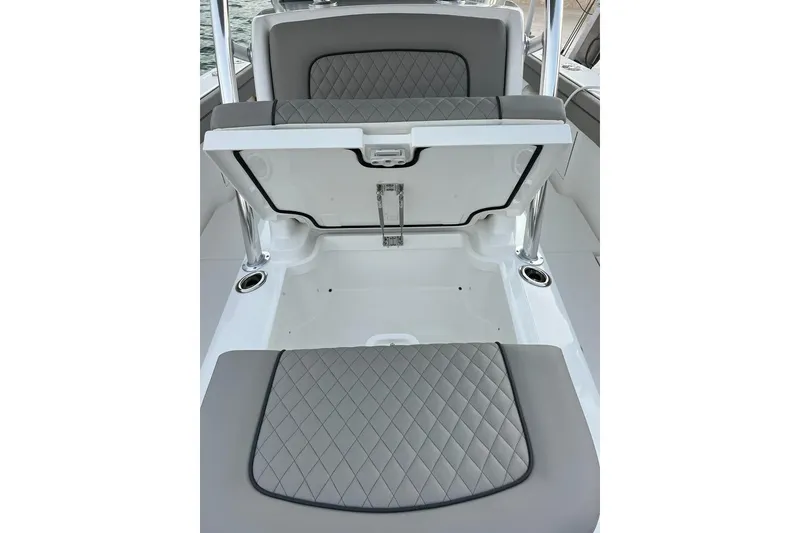 Slide: The Image of 2023 Valhalla Boatworks V-37 interior with open storage compartment and quilted seating. - 11