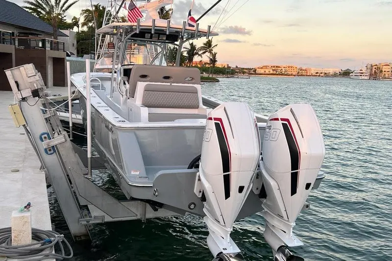 Slide: The Image of 2023 Valhalla Boatworks V-37 docked with dual engines, scenic waterfront view. - 3