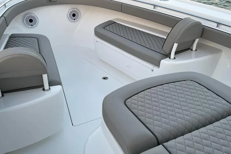 Slide: The Image of 2023 Valhalla Boatworks V-37 interior with gray quilted seating and sleek design. - 4