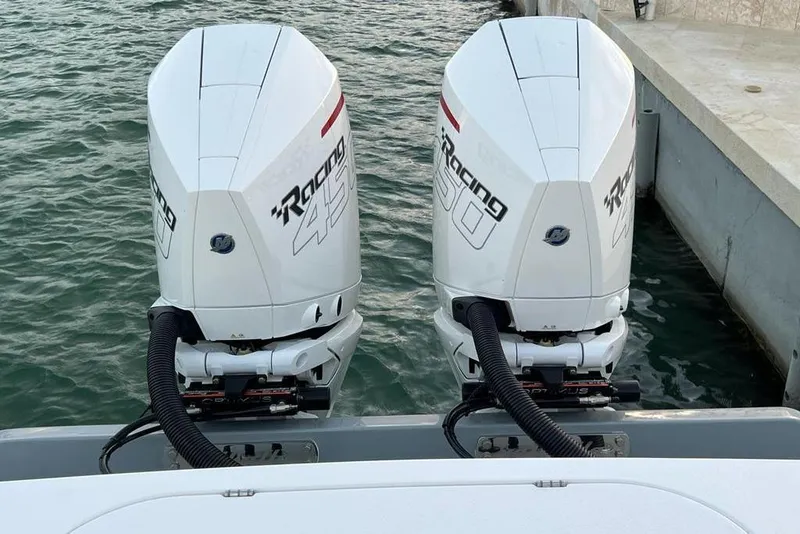 Slide: The Image of 2023 Valhalla Boatworks V-37 with twin Racing 450 outboard engines on water. - 8
