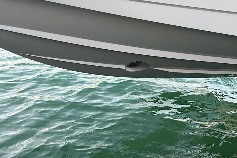 Slide: The Image of 2023 Valhalla Boatworks V-37 hull above water, showcasing sleek design. - 9