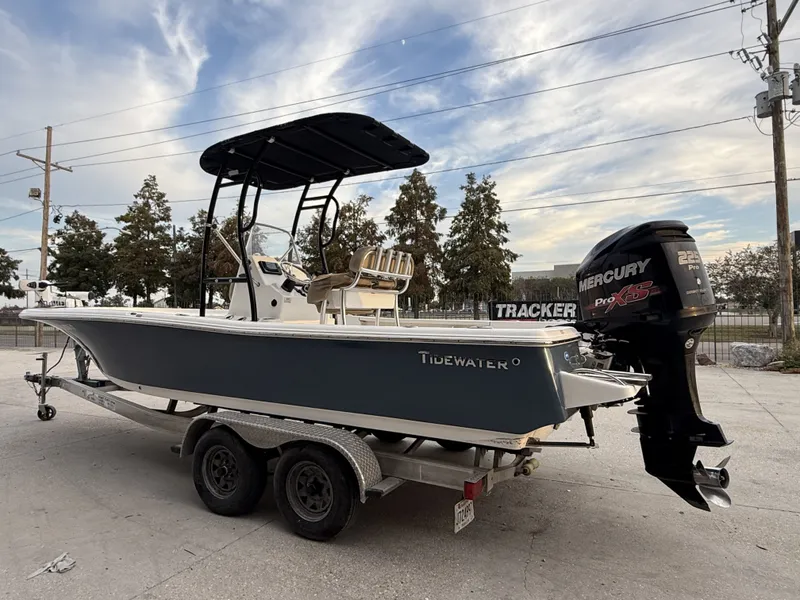 Slide: The Image of Interior view of a 2016 Tidewater 2200 boat on a parking lot. - 12