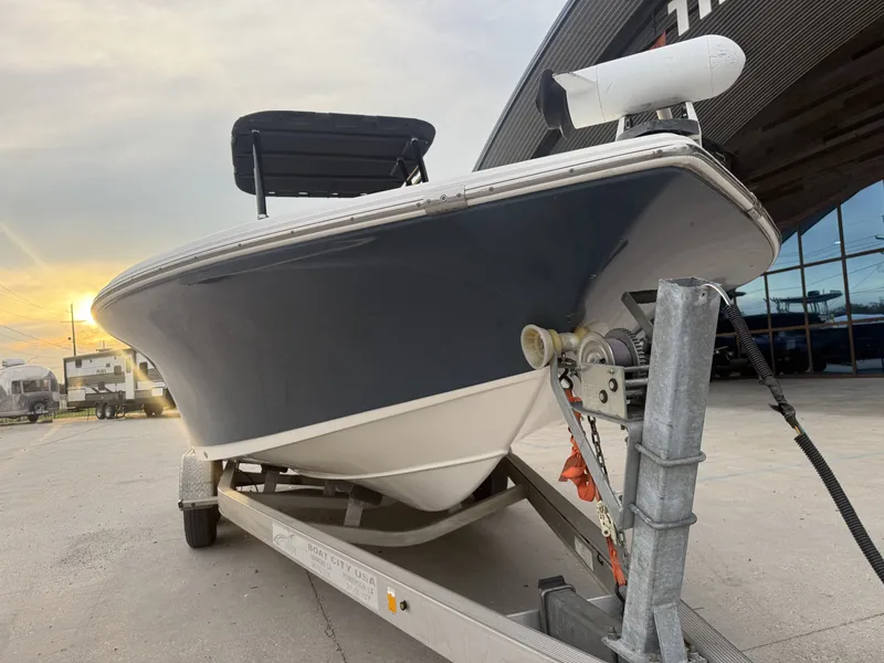 Slide: The Image of 2016 Tidewater 2200 boat on trailer at sunset. - 9