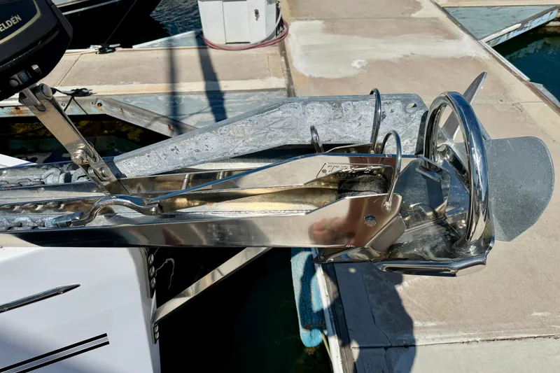 Slide: The Image of Catalina 425 (2020) anchor system on docked sailboat, featuring stainless steel components. - 23