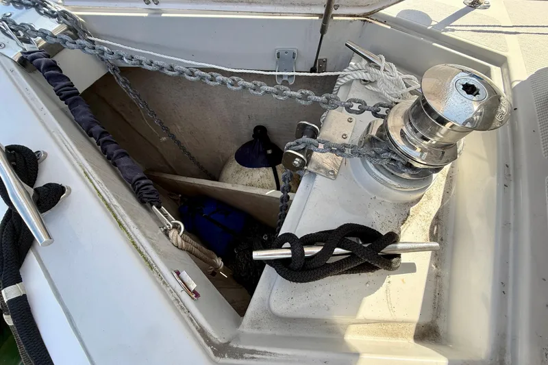 Slide: The Image of Anchor locker of 2020 Catalina 425 sailboat with winch and ropes. - 25