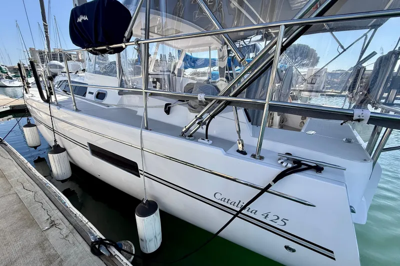 Slide: The Image of 2020 Catalina 425 sailboat docked at marina, featuring sleek design and modern fittings. - 3