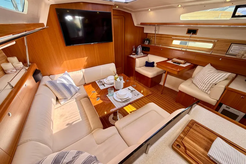Slide: The Image of Luxurious interior of 2020 Catalina 425 yacht with elegant seating and dining area. - 38