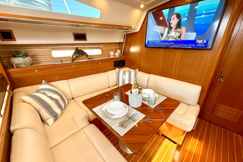 Slide: The Image of Luxurious interior of 2020 Catalina 425 yacht with elegant dining area and TV. - 41