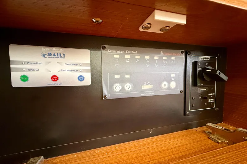 Slide: The Image of Control panel of a 2020 Catalina 425 yacht with generator and watermaker systems. - 58