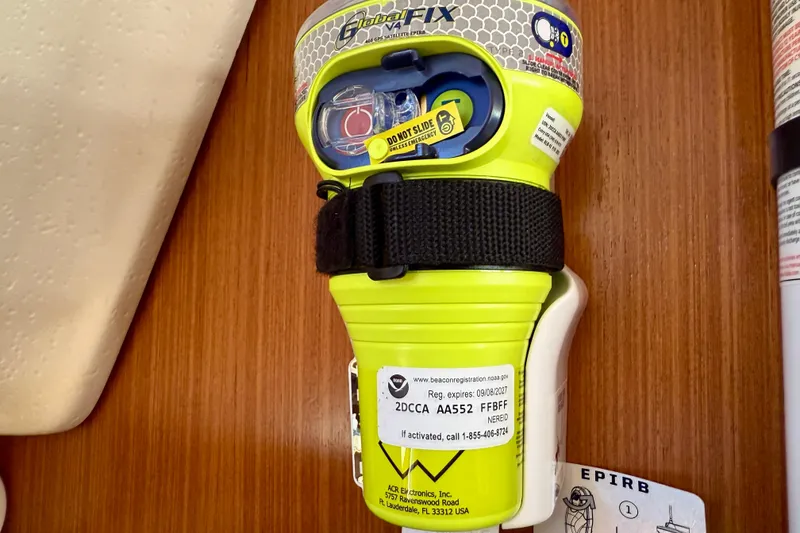 Slide: The Image of EPIRB device mounted on a Catalina 425 yacht, 2020 model, for emergency signaling. - 63