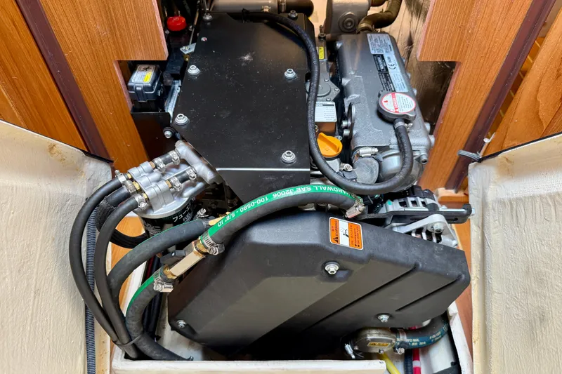 Slide: The Image of Engine compartment of a 2020 Catalina 425 sailboat, showcasing detailed mechanical components. - 65