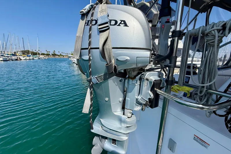 Slide: The Image of Catalina 425 sailboat with Honda outboard motor, docked in a marina, 2020 model. - 75