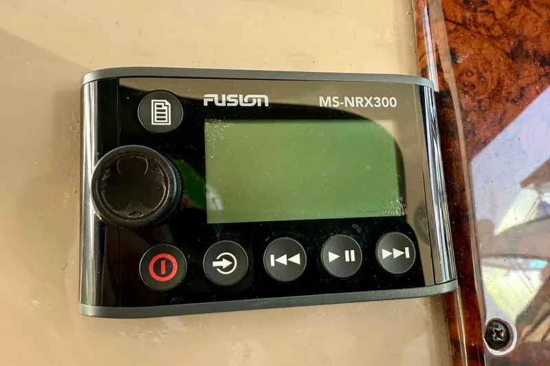 Slide: The Image of Fusion MS-NRX300 marine stereo controller on 2003 Sea Ray 380 Sundancer yacht. - 16