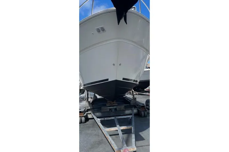 Slide: The Image of 2003 Sea Ray 380 Sundancer yacht on trailer, viewed from the front. - 47