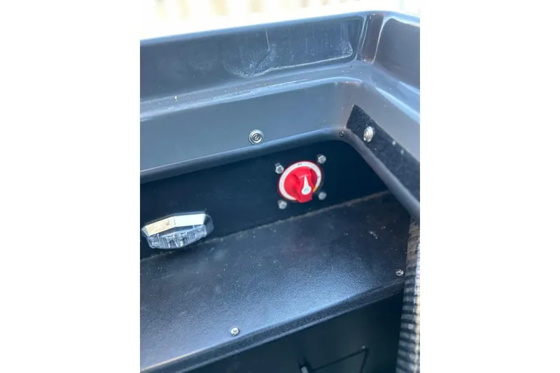 Slide: The Image of 2018 Tigé R20 boat dashboard with red ignition switch and chrome detail. - 33