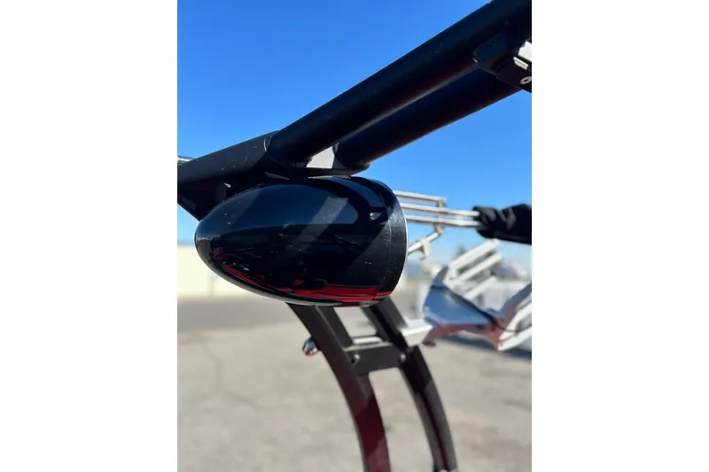 Slide: The Image of Close-up of a 2018 Tigé R20 boat's black speaker against a clear blue sky. - 34