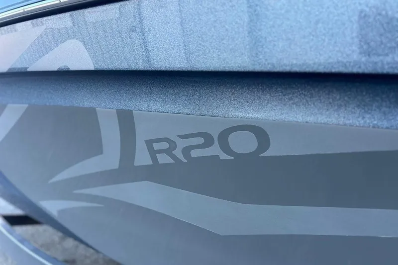 Slide: The Image of 2018 Tigé R20 boat close-up, showcasing sleek design and branding. - 7