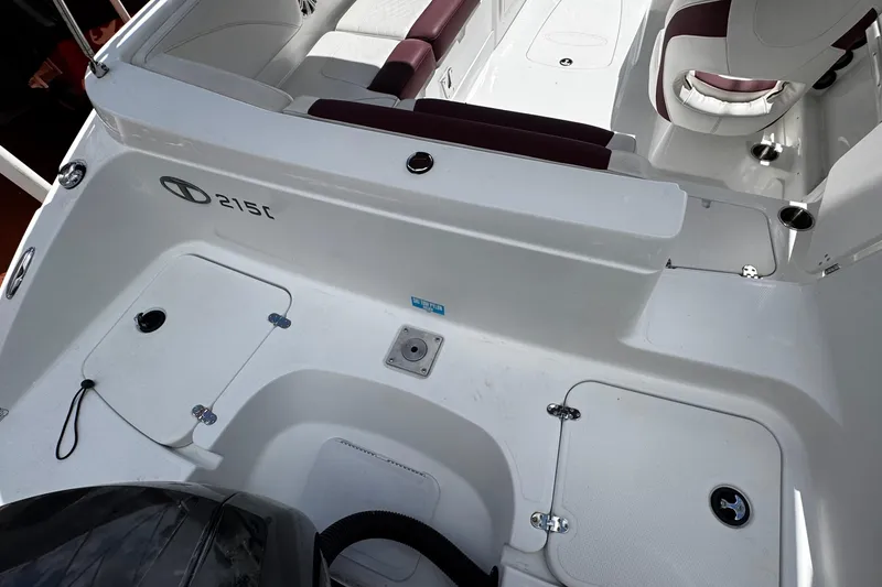 Slide: The Image of 2017 Tahoe 2150 boat interior with seating and storage compartments. - 8