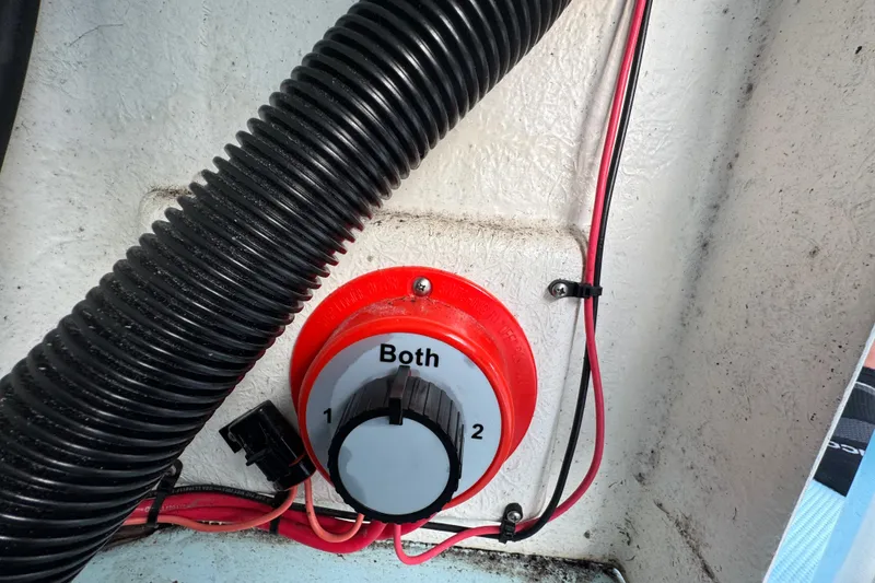 Slide: The Image of Battery switch on 2024 Panga 25 CC boat with wiring and tubing. - 15