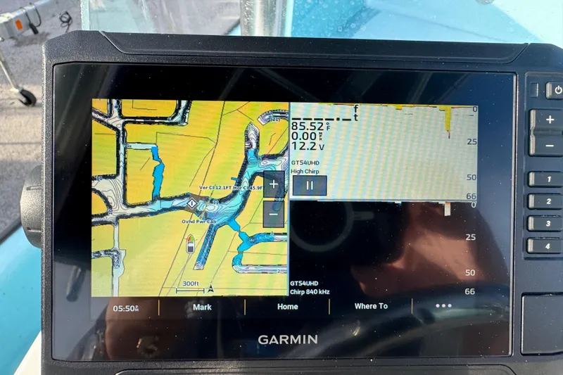 Slide: The Image of Garmin marine GPS display on 2024 Panga 25 CC boat, showing navigation map and sonar data. - 16
