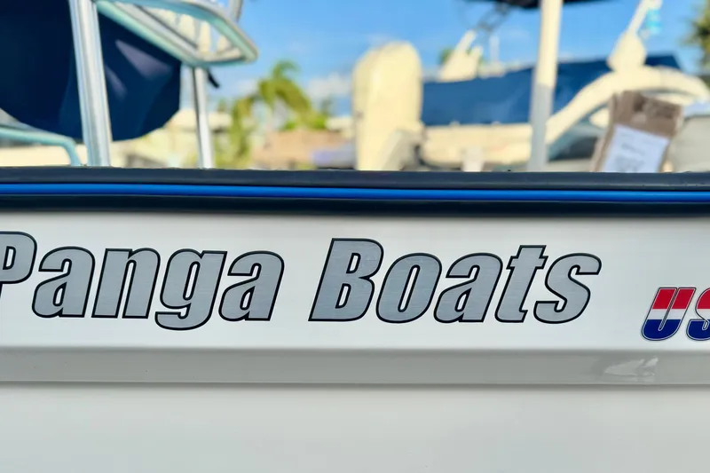 Slide: The Image of Close-up of 2024 Panga 25 CC boat with "Panga Boats" logo. - 43