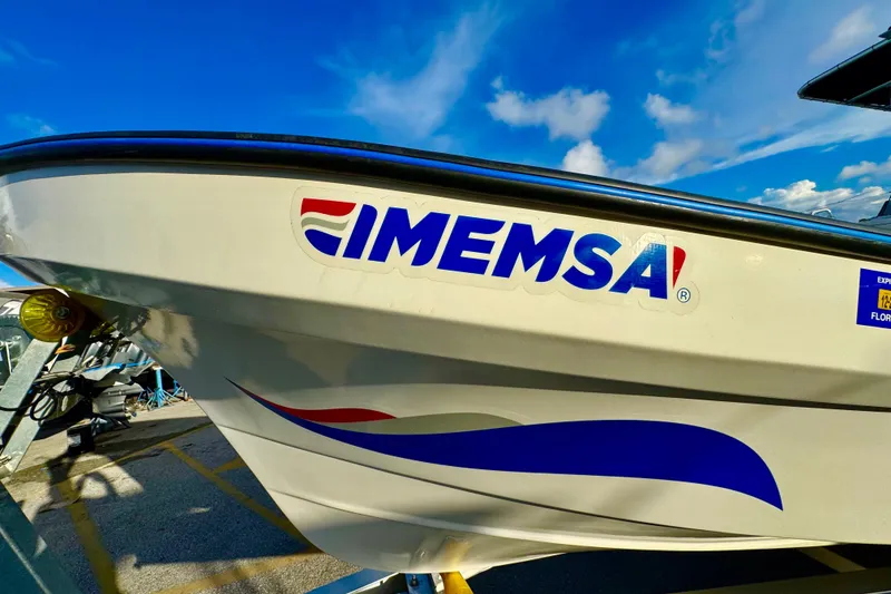 Slide: The Image of 2024 Panga 25 CC boat with IMEMSA logo, under a clear blue sky. - 46
