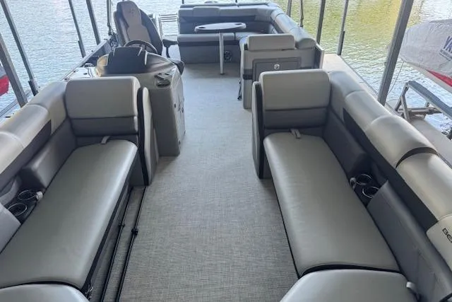 Slide: The Image of 2022 Berkshire 250CL STS pontoon boat interior with spacious seating and modern design. - 18
