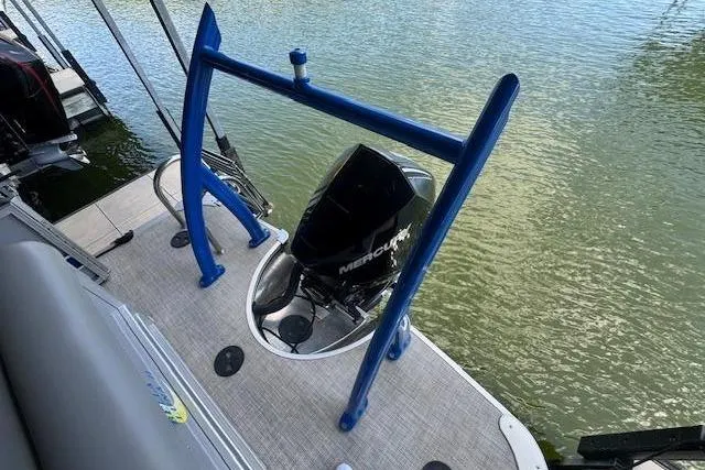 Slide: The Image of 2022 Berkshire 250CL STS boat with Mercury outboard motor on a calm lake. - 25