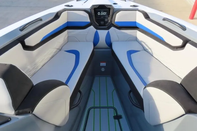 Slide: The Image of 2025 Sunsation 32 CCX boat interior with modern seating and digital display. - 15