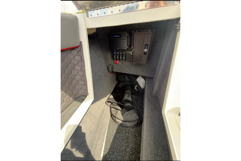 Slide: The Image of 2021 Cobalt R8 Surf boat interior with sleek seating and modern dashboard design. - 10