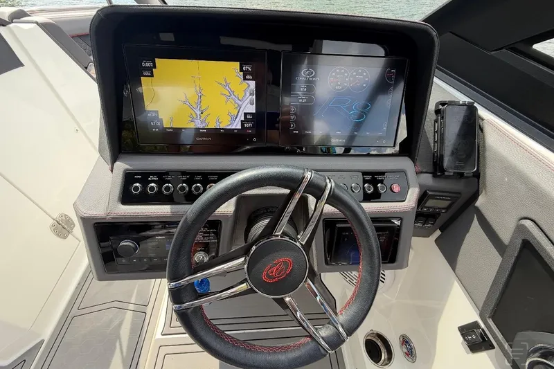 Slide: The Image of Interior storage of 2021 Cobalt R8 Surf boat with life jackets and netting. - 11