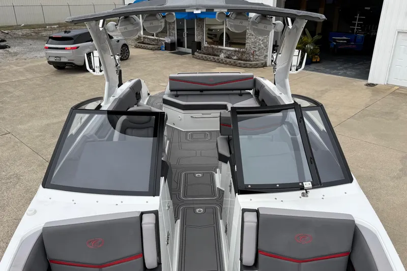 Slide: The Image of 2021 Cobalt R8 Surf boat with sleek interior design and modern features. - 14