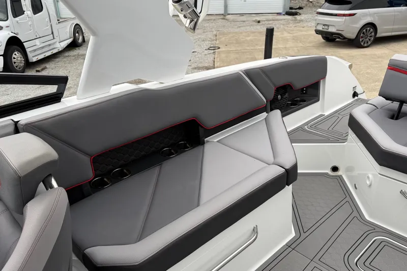 Slide: The Image of 2021 Cobalt R8 Surf boat interior with gray seating and modern design. - 16