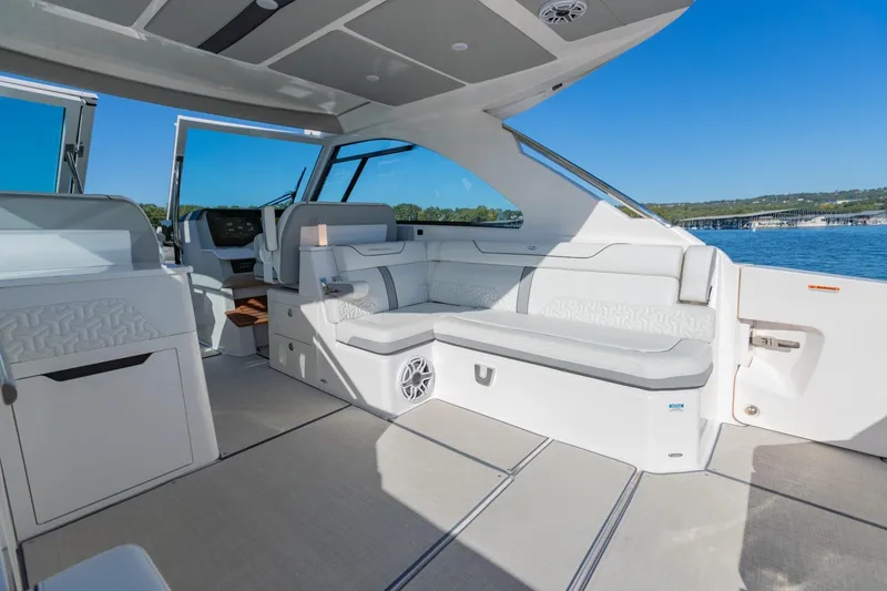 Slide: The Image of Luxurious interior of 2023 Regal LS36 boat with spacious seating and modern design. - 15