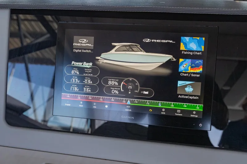 Slide: The Image of 2023 Regal LS36 boat dashboard display with digital controls and navigation features. - 28