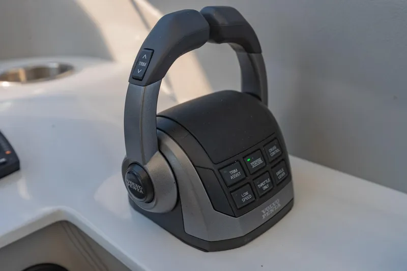 Slide: The Image of Throttle control panel on 2023 Regal LS36 boat, featuring Volvo Penta controls. - 32