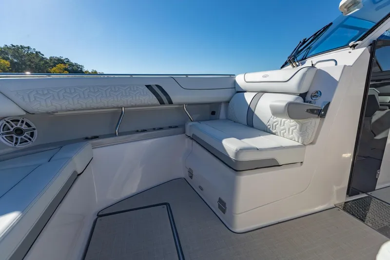 Slide: The Image of 2023 Regal LS36 boat interior with luxurious seating and modern design. - 38
