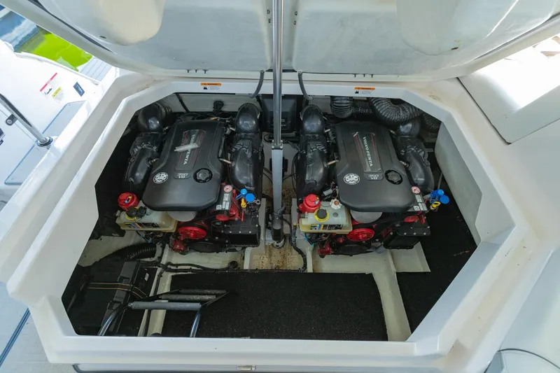 Slide: The Image of 2023 Regal LS36 boat engine compartment with dual powerful engines. - 43