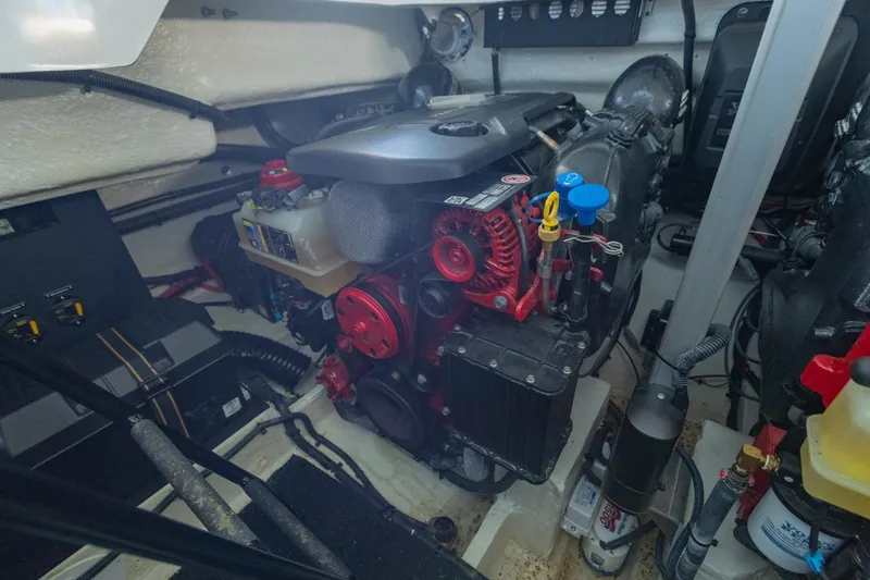 Slide: The Image of Engine compartment of 2023 Regal LS36 boat, showcasing detailed mechanical components. - 44