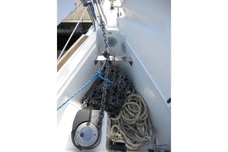 Slide: The Image of Anchor chain and ropes on Jeanneau Sun Odyssey 349, 2022 model sailboat deck. - 39